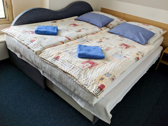 Podkrovní čtyřlůžkový apartmán s výhledem na hory